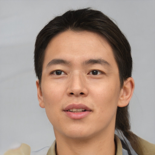 Neutral asian young-adult male with short  brown hair and brown eyes