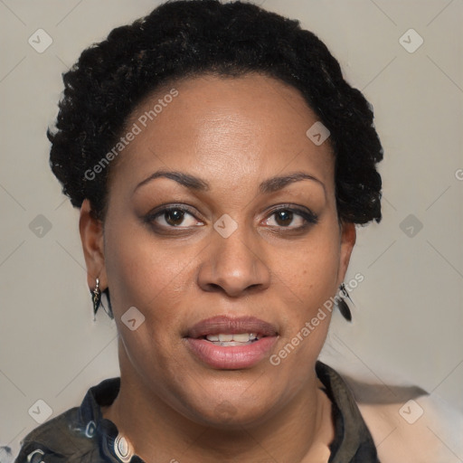 Joyful black adult female with short  brown hair and brown eyes