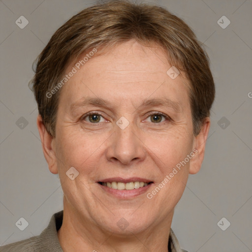 Joyful white adult female with short  brown hair and grey eyes