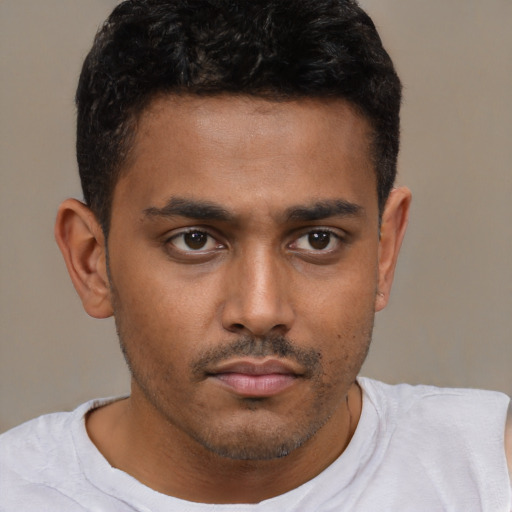 Neutral latino young-adult male with short  brown hair and brown eyes