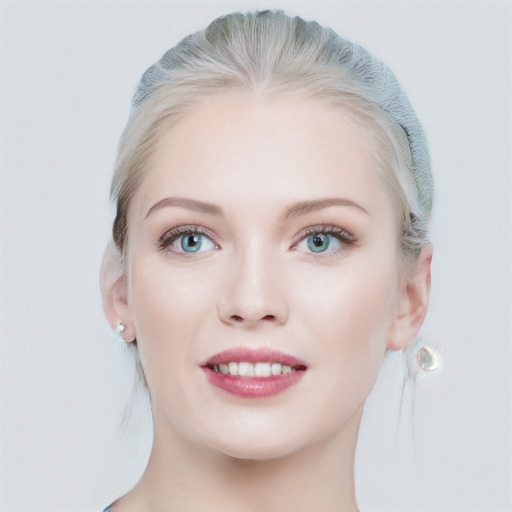 Joyful white young-adult female with medium  brown hair and blue eyes