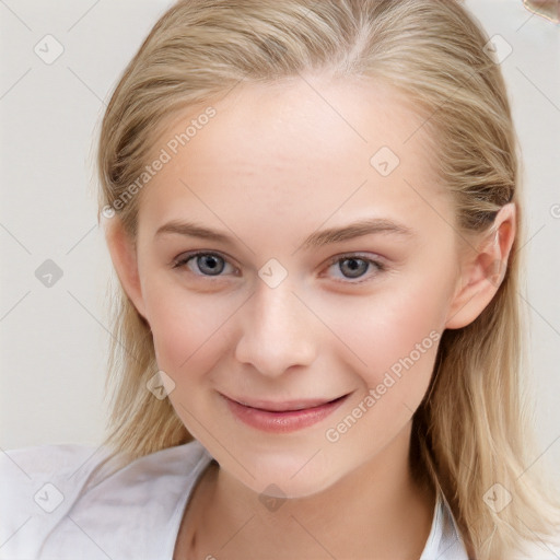 Joyful white child female with medium  brown hair and blue eyes