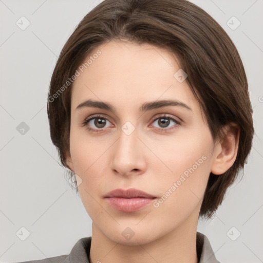 Neutral white young-adult female with medium  brown hair and brown eyes