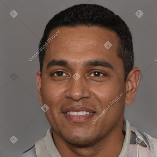 Joyful latino young-adult male with short  black hair and brown eyes