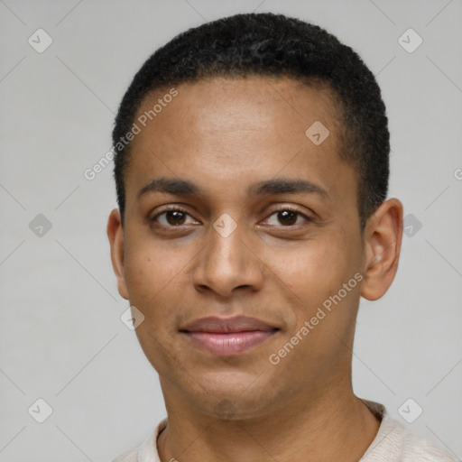 Joyful latino young-adult male with short  brown hair and brown eyes