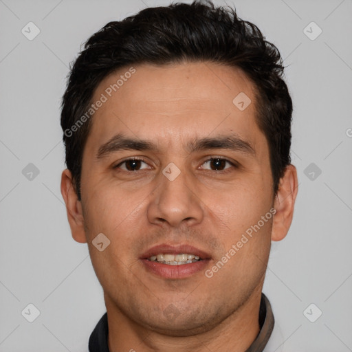 Joyful white adult male with short  brown hair and brown eyes