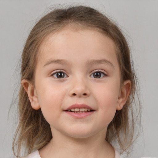 Joyful white child female with medium  brown hair and grey eyes