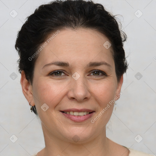 Joyful white adult female with short  brown hair and brown eyes