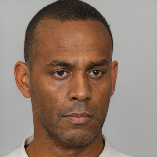 Neutral black adult male with short  brown hair and brown eyes