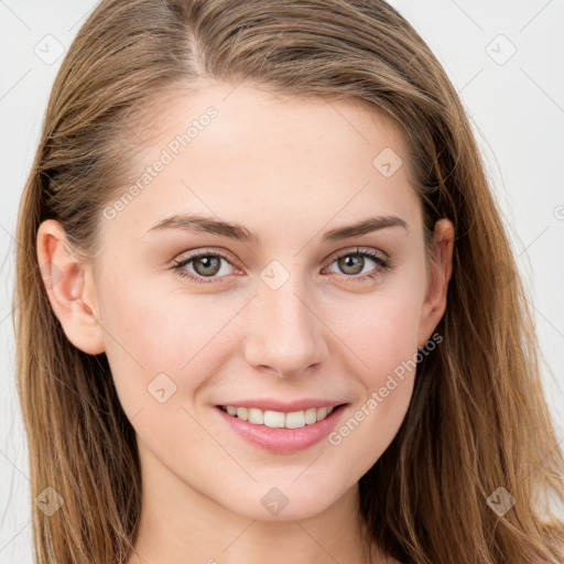 Joyful white young-adult female with long  brown hair and blue eyes