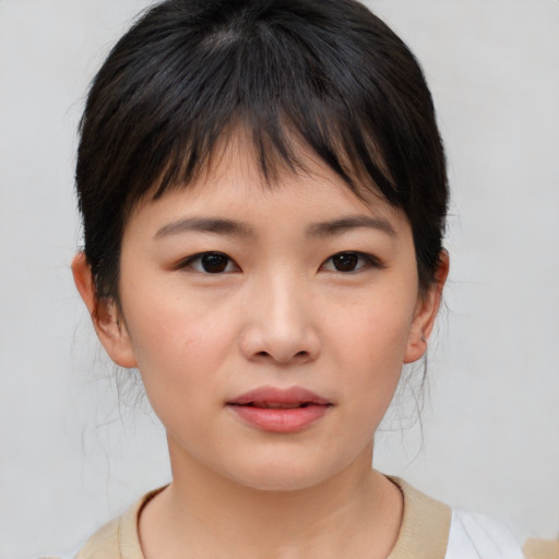 Neutral asian child female with medium  brown hair and brown eyes