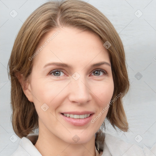 Joyful white adult female with medium  brown hair and grey eyes