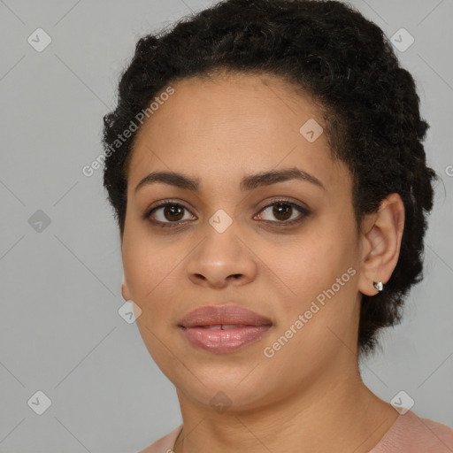 Joyful latino young-adult female with short  black hair and brown eyes