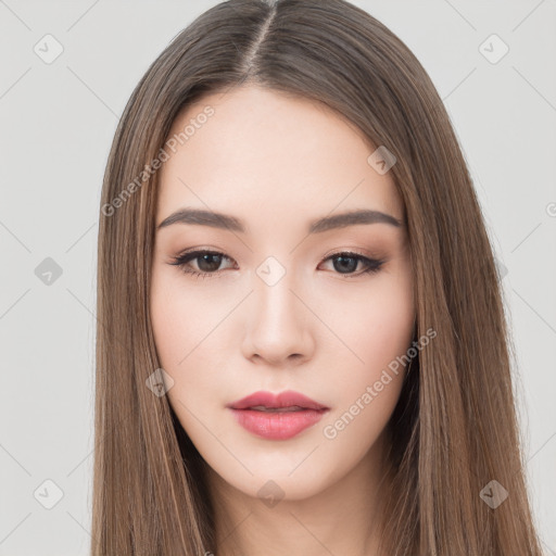 Neutral white young-adult female with long  brown hair and brown eyes