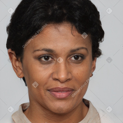 Joyful black adult female with short  brown hair and brown eyes