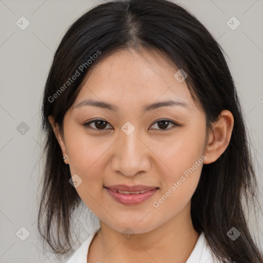 Joyful asian young-adult female with medium  brown hair and brown eyes