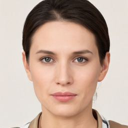 Neutral white young-adult female with short  brown hair and brown eyes