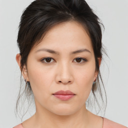 Neutral asian young-adult female with medium  brown hair and brown eyes