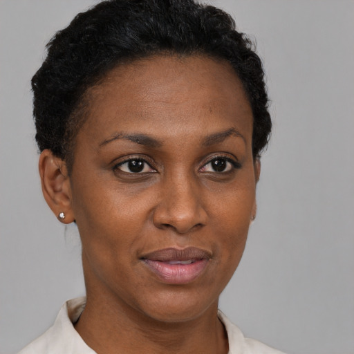 Neutral black adult female with short  brown hair and brown eyes