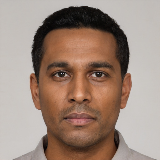 Neutral latino young-adult male with short  black hair and brown eyes