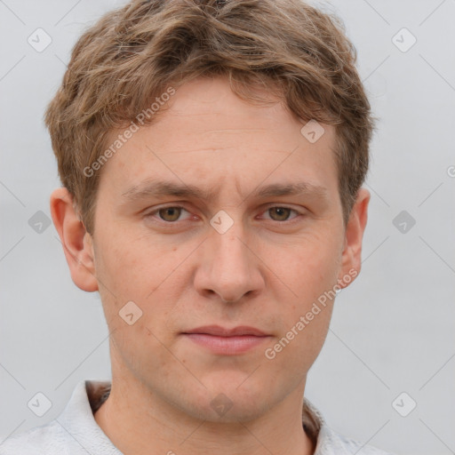 Neutral white young-adult male with short  brown hair and grey eyes