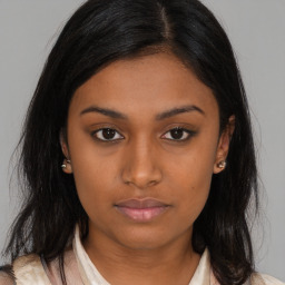 Neutral asian young-adult female with medium  brown hair and brown eyes