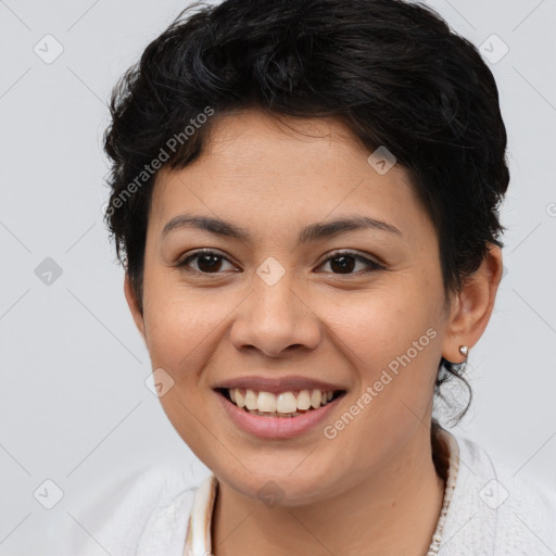 Joyful asian young-adult female with short  brown hair and brown eyes