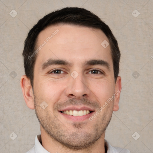 Joyful white young-adult male with short  brown hair and brown eyes