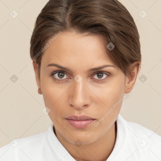 Neutral white young-adult female with short  brown hair and brown eyes