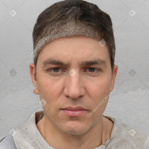 Neutral white adult male with short  brown hair and brown eyes