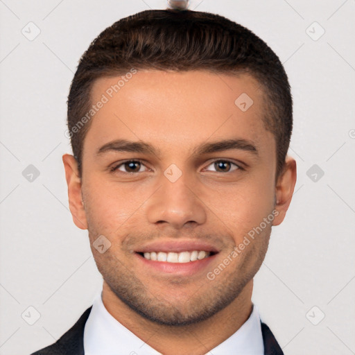 Joyful white young-adult male with short  brown hair and brown eyes