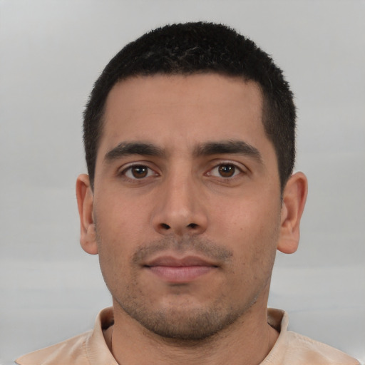 Neutral white young-adult male with short  black hair and brown eyes