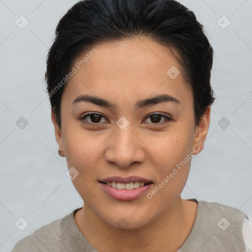 Joyful latino young-adult female with short  brown hair and brown eyes