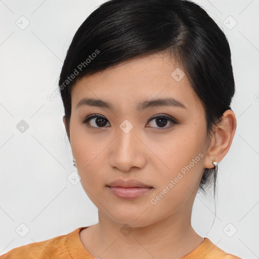 Neutral asian young-adult female with medium  brown hair and brown eyes