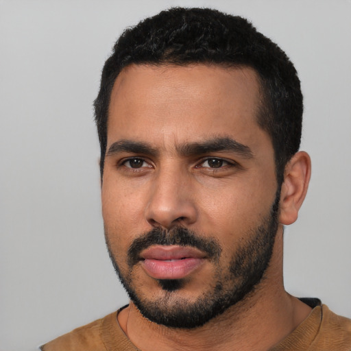 Neutral latino young-adult male with short  black hair and brown eyes