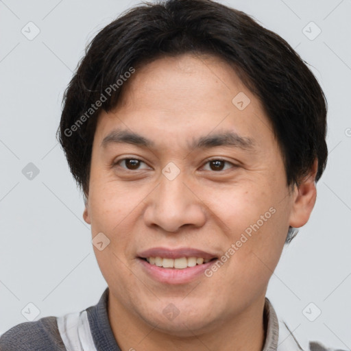 Joyful white adult male with short  brown hair and brown eyes