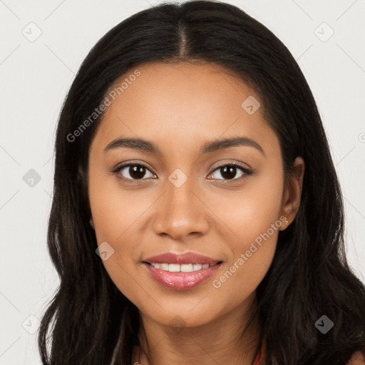 Joyful latino young-adult female with long  black hair and brown eyes