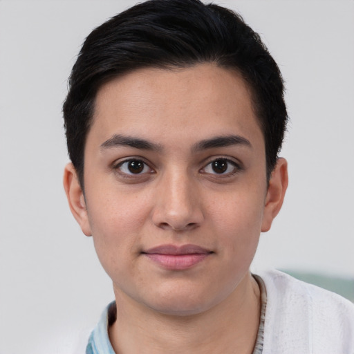 Joyful white young-adult female with short  black hair and brown eyes