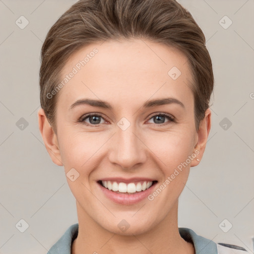 Joyful white young-adult female with short  brown hair and brown eyes