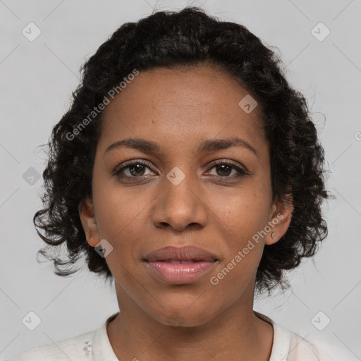 Joyful black young-adult female with short  brown hair and brown eyes