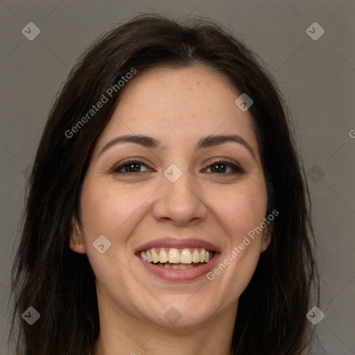 Joyful white young-adult female with long  brown hair and brown eyes