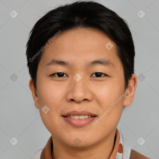 Joyful asian young-adult male with short  brown hair and brown eyes