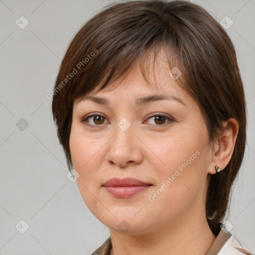 Joyful white adult female with medium  brown hair and brown eyes