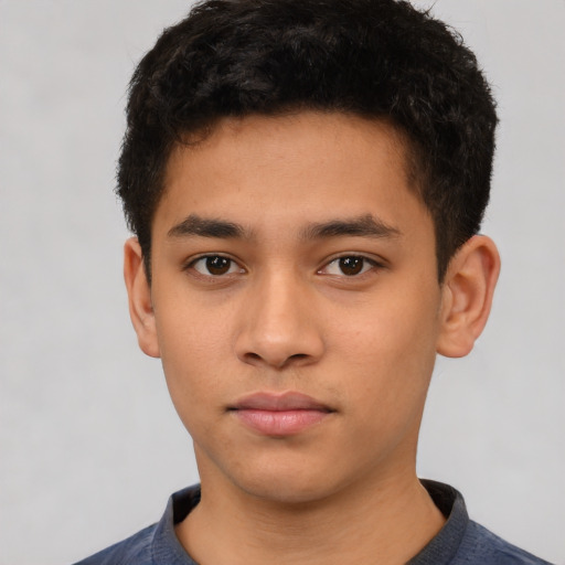 Neutral latino young-adult male with short  black hair and brown eyes