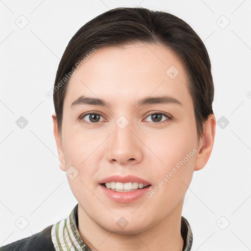 Joyful white young-adult female with short  brown hair and brown eyes