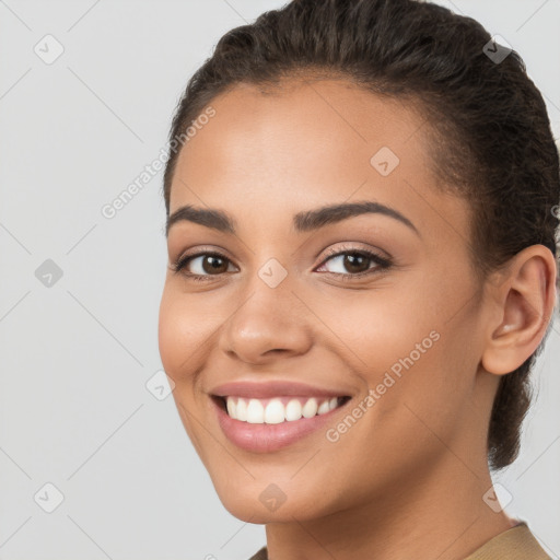 Joyful white young-adult female with short  brown hair and brown eyes