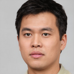 Neutral asian young-adult male with short  black hair and brown eyes