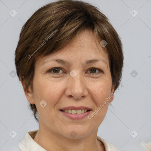 Joyful white adult female with short  brown hair and brown eyes