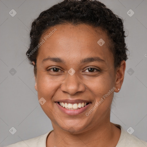 Joyful white adult female with short  brown hair and brown eyes