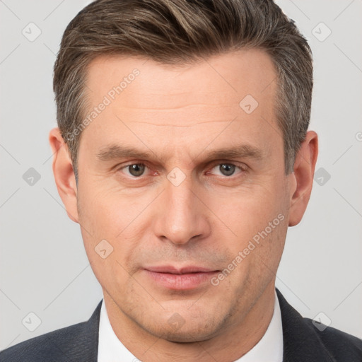 Neutral white adult male with short  brown hair and brown eyes